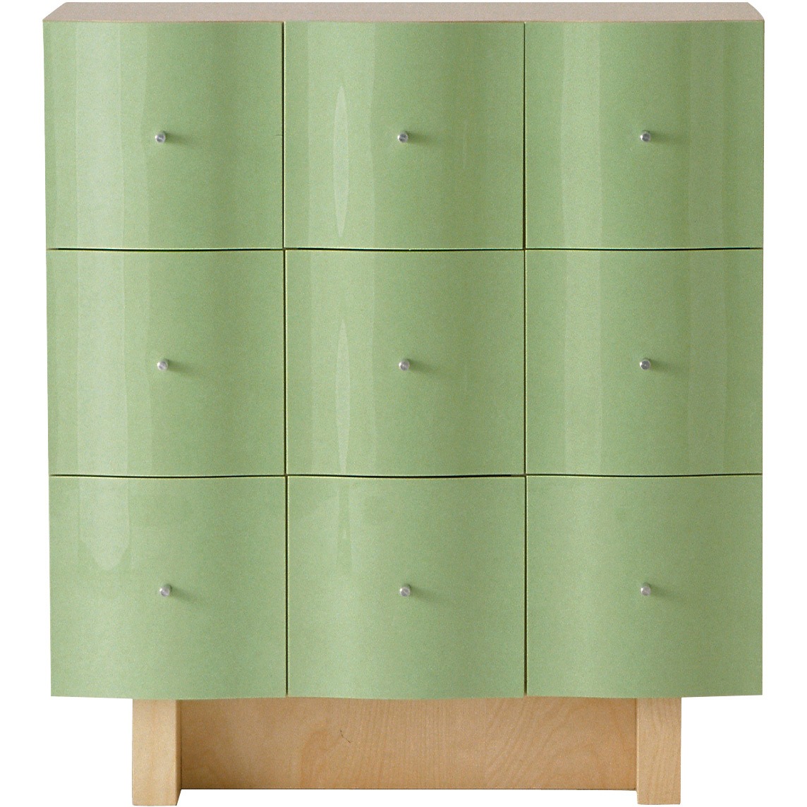 Green chest of nine drawers with a bulbous, wavy front, standing on a base of natural wood, VAJER.