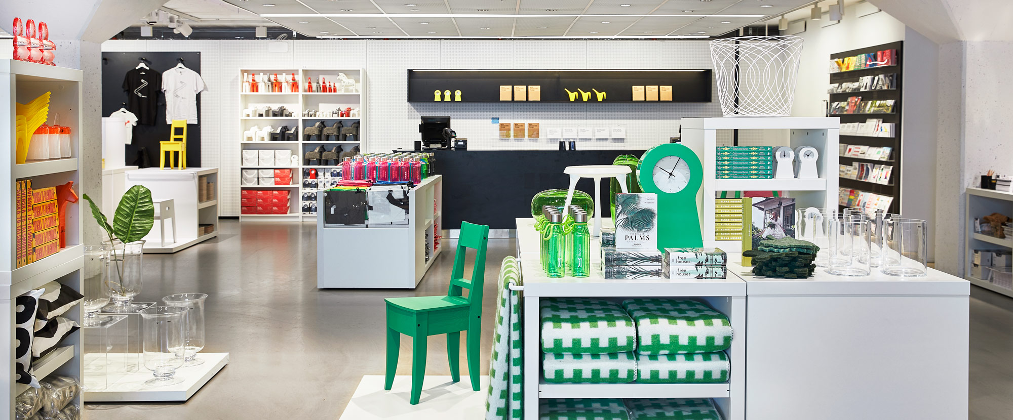 Overview of bright, colourful interior of IKEA Museum shop floor.