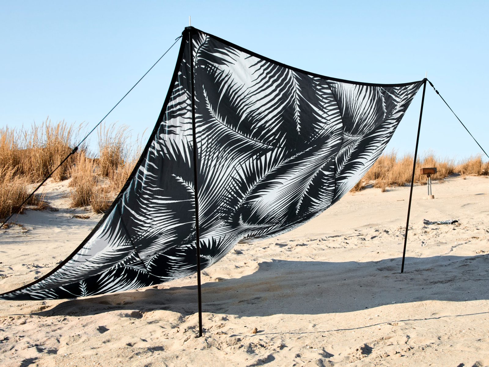 Simple black and white beach wind and sun shelter, from IKEA KÅSEBERGA surf collection.