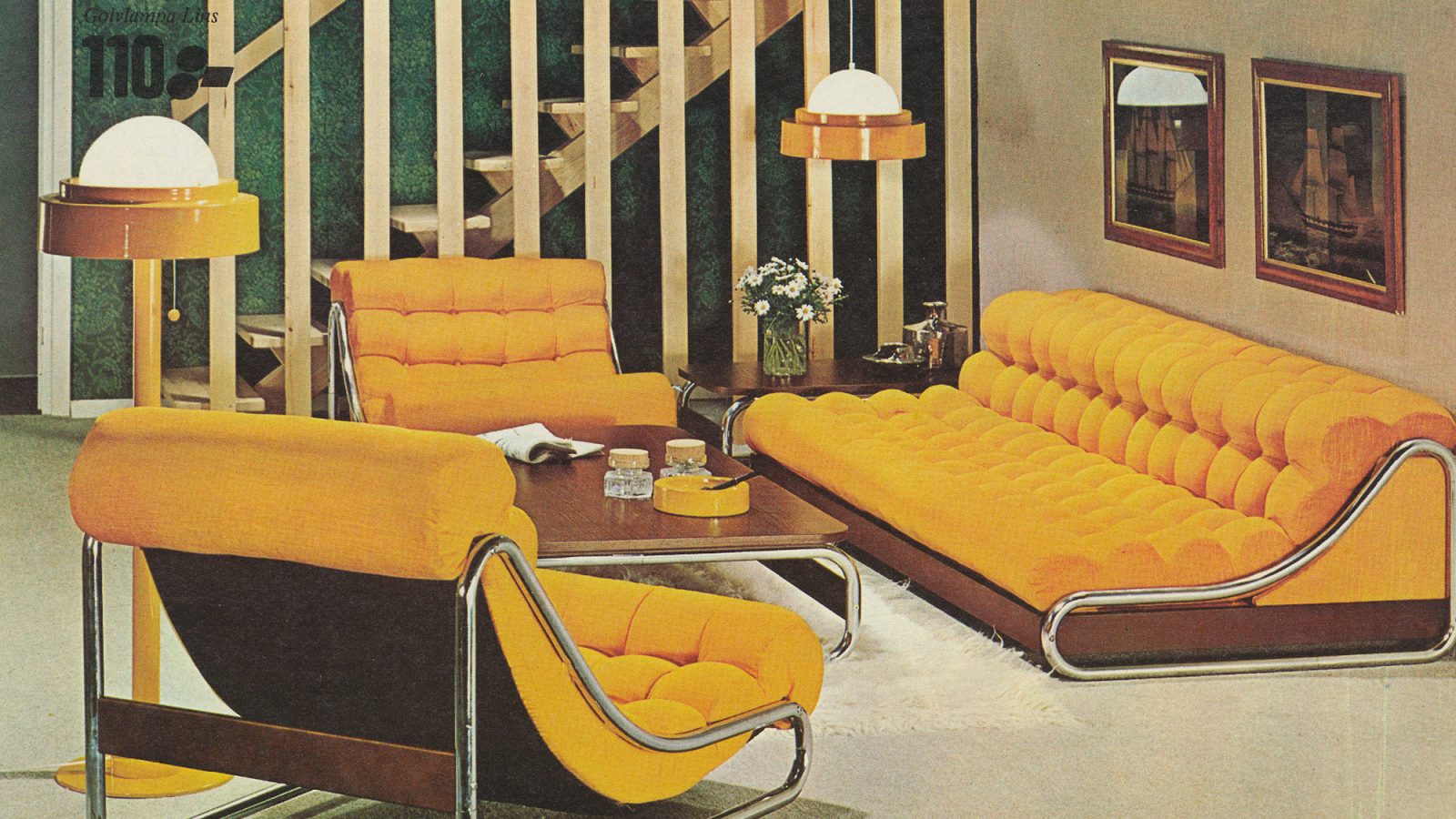Low yellow lounge furniture with chrome frames.