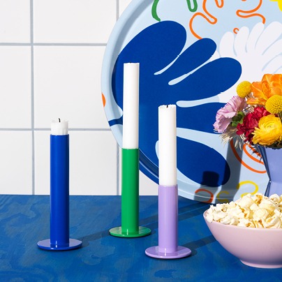 Simple candlesticks in metal, blue, green and lilac.